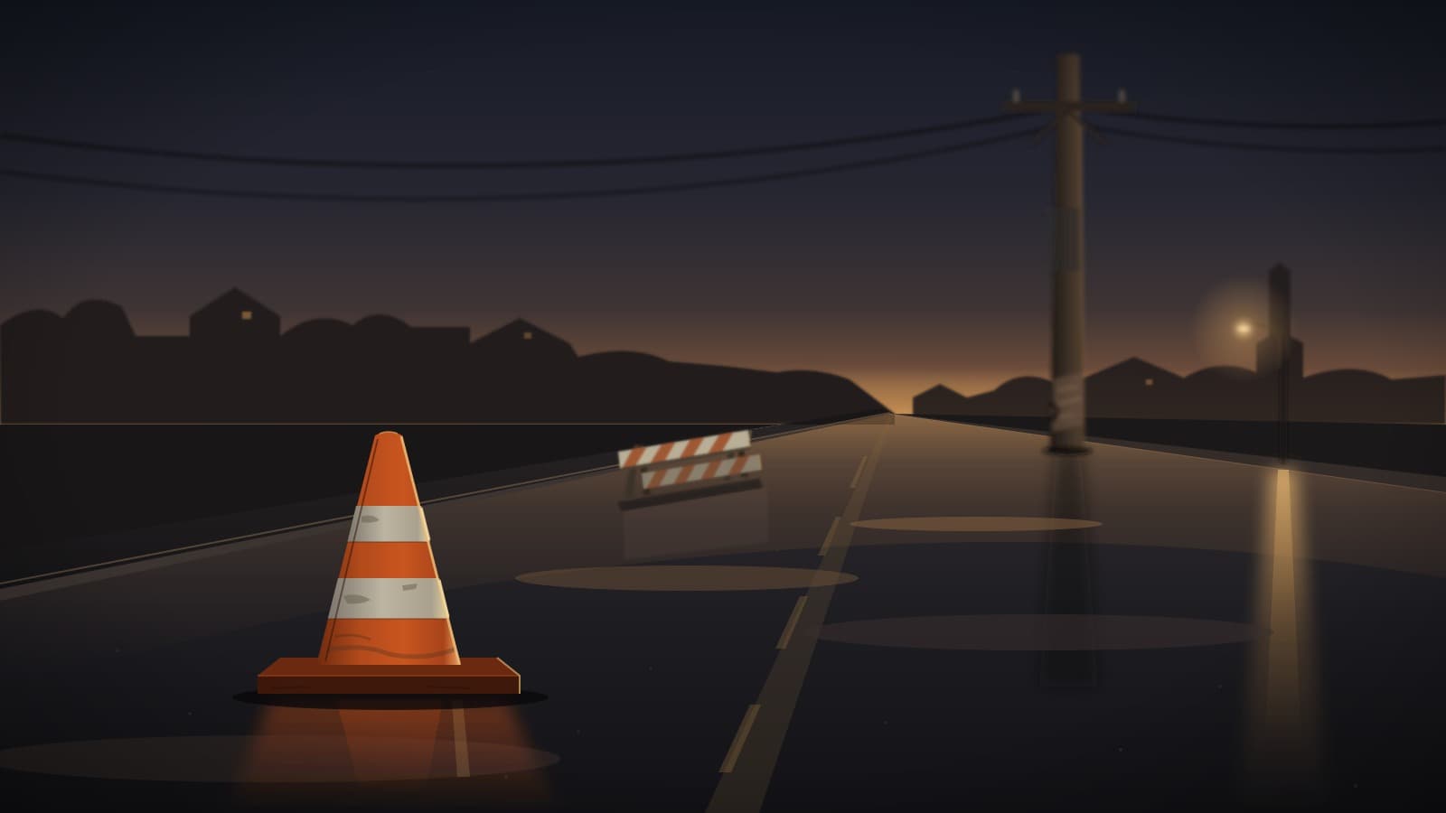 A lone orange traffic cone sits on wet asphalt at dusk beside a folded barricade, with a utility pole softly blurred in the distance under an amber and deep blue sky.