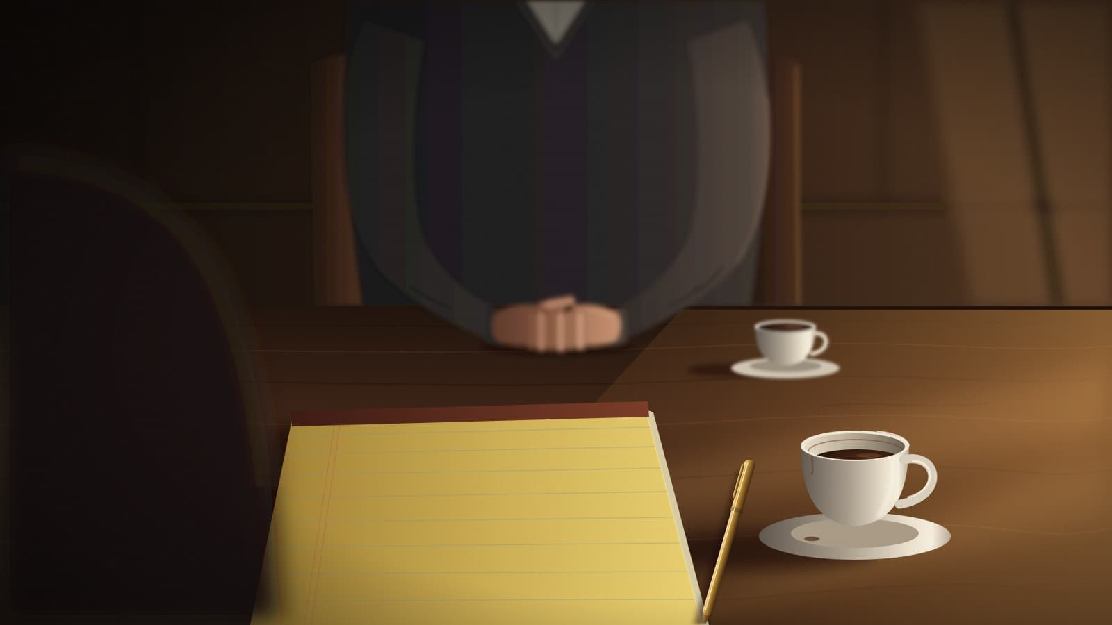 Over a lawyer's shoulder, two coffee cups and a blank legal pad with a brass pen sit on a dark wooden consultation table, with a client's folded hands softly blurred on the far side in warm window light.
